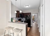 Thumbnail 25 of 35 - Fully Furnished Kitchen With Stainless Steel Appliances at Encore Townhomes, Utica, MI, Michigan , 48315