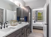 Thumbnail 26 of 38 - Modern Bathroom with Framed Mirror at Encore at West Valley, Michigan