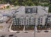 Thumbnail 49 of 66 - Exterior and parking at Ovation at Paine Field apartments in Everett, WA