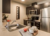 Thumbnail 11 of 23 - Fully Equipped Kitchen with Microwave, Dishwasher and USB Outlet