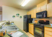 Thumbnail 16 of 30 - Fully Equipped Kitchen at The Seasons at Lea Hill Village, Auburn, 98092
