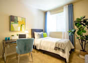 Thumbnail 24 of 37 - Bedroom with study table at Discovery Heights, Washington
