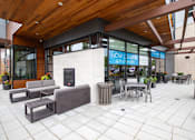 Thumbnail 11 of 18 - Outdoor Fireplace Lounge at Discovery West, Issaquah, Washington