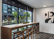 Thumbnail 12 of 43 - Room with Table and Chair at Solera Apartments, Renton, WA, 98056