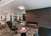 Thumbnail 20 of 43 - Living Area with Fireplace at Solera Apartments, Renton, WA