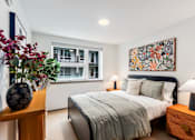 Thumbnail 30 of 43 - Bedroom with bed at Solera Apartments, Renton, Washington