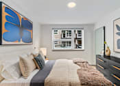 Thumbnail 42 of 43 - Bedroom with a Large Bed at Solera Apartments, Renton