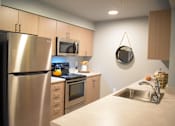 Thumbnail 5 of 35 - Fully Equipped Kitchen with Microwave and Dishwasher at Manor Way, WA, 98204