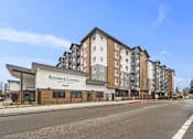Thumbnail 1 of 21 - Main exterior entrance to Kendrick Landing Apartments in Lakewood, WA