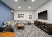 Thumbnail 16 of 21 - Community game room and lounge at Kendrick Landing Apartments in Lakewood, WA