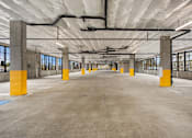 Thumbnail 20 of 21 - Covered garage parking at Kendrick Landing Apartments in Lakewood, WA