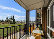 Thumbnail 6 of 21 - Private apartment patio overlooking the playground at Kendrick Landing Apartments