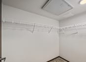 Thumbnail 9 of 21 - Walk-in closet inside a model apartment at Kendrick Landing Apartments