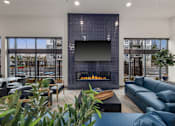 Thumbnail 12 of 21 - Resident lobby with fireplace at Kendrick Landing Apartments in Lakewood, WA