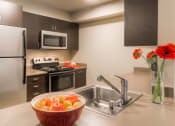 Thumbnail 14 of 29 - Fully Equipped Kitchen with Refrigerator, Microwave, Dishwasher & USB outlet