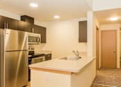 Thumbnail 15 of 23 - Fully Equipped Kitchen with Refrigerator, Microwave and Dishwasher
