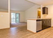 Thumbnail 17 of 23 - Dining Room and Kitchen