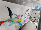 Thumbnail 28 of 46 - a wall with many different colors of paint on it