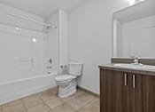 Thumbnail 11 of 46 - a bathroom with a toilet sink and a shower