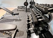 Thumbnail 22 of 46 - the gym is equipped with weights and cardio equipment