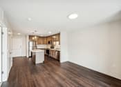 Thumbnail 31 of 43 - the preserve at ballantyne commons apartment living room and kitchen