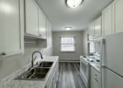 Thumbnail 9 of 39 - Priscilla Standish Apartments Kitchen
