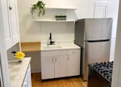 Thumbnail 29 of 46 - Grand & Dale Apartments Kitchen