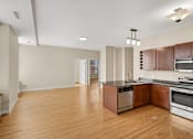 Thumbnail 21 of 68 - the preserve at ballantyne commons apartment living room and kitchen