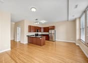 Thumbnail 24 of 68 - the preserve at ballantyne commons apartment living room and kitchen