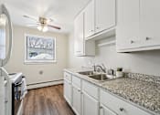Thumbnail 8 of 39 - Priscilla Standish Apartments Kitchen