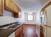 Thumbnail 12 of 41 - Silver Bell Apartments Kitchen, Eagan, Minnesota