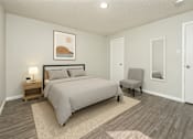Thumbnail 5 of 12 - A bedroom with a bed, chair, and painting on the wall.