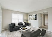 Thumbnail 2 of 13 - A living room with a grey couch, a coffee table, and a painting on the wall.