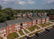 Thumbnail 1 of 20 - an aerial view of a row of brick apartment buildings