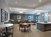 Thumbnail 16 of 20 - a large dining room with tables and chairs