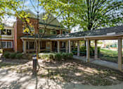 Thumbnail 19 of 24 - a view of the front porch of a house with a porch swing