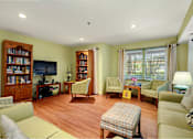 Thumbnail 13 of 24 - a living room filled with furniture and a tv