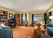 Thumbnail 8 of 24 - a living room filled with furniture and a tv