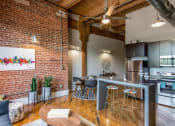 Thumbnail 2 of 46 - Living Area With Kitchen View at The Hudson, Richmond, 23224