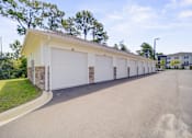Thumbnail 19 of 50 - Row of garage doors at The Enclave at Deer Moss Creek, Niceville, 32578