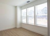 Thumbnail 33 of 81 - a bedroom with white walls and a wooden floor at Ainsworth, Richmond, Virginia