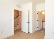 Thumbnail 31 of 81 - a bedroom with a staircase in a 555 waverly unit at Ainsworth, Virginia