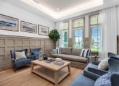 Thumbnail 30 of 35 - a living room with couches and chairs and a coffee table at The Enclave at Deer Moss Creek, Niceville, FL, 32578