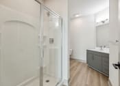 Thumbnail 4 of 31 - a bathroom with a shower and a sink and a toilet at The Falstaff, North Carolina, 27610