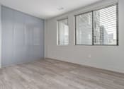 Thumbnail 45 of 52 - A room with a window and a sliding door.