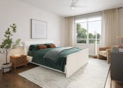 Thumbnail 21 of 44 - a bedroom with a white bed and a green blanket at Boardwalk at Research Park in AL 35811