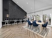Thumbnail 10 of 50 - A modern dining room with a wooden table and chairs.