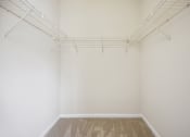 Thumbnail 5 of 46 - a room with white walls and a carpet and a white closet