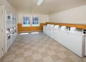 Thumbnail 10 of 12 - Laundry Care Center at Woodbriar Apartments