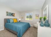 Thumbnail 9 of 43 - a bedroom with a bed and a window at Village 1373, Greensboro, NC